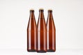 Group brown NRW beer bottles 500ml mock up. Royalty Free Stock Photo