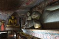 Group of Buddha statues in cave buddhist temple Royalty Free Stock Photo