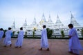 Buddhist women are practices Dharma in front of the white pagodas