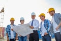 Group of builders and architects with blueprint Royalty Free Stock Photo