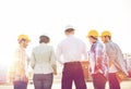 Group of builders and architects at building site Royalty Free Stock Photo