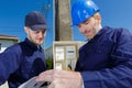 group builders in hardhats at construction site Royalty Free Stock Photo