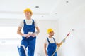 Group of builders with tools indoors Royalty Free Stock Photo