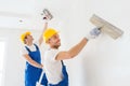 Group of builders with tools indoors Royalty Free Stock Photo