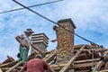 Group of builders working on the roof of the house. Zrenjanin, Serbia.