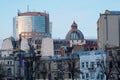 Group of buildings of different ages and architectural styles in Bucharest at twilight Royalty Free Stock Photo