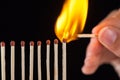 Group of burn and unburned matches, on black background Royalty Free Stock Photo