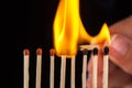 Group of burn and unburned matches, on black background Royalty Free Stock Photo