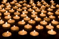 Group of burning candles at a black background Royalty Free Stock Photo