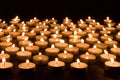 Group of burning candles at a black background Royalty Free Stock Photo