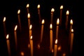 Group of burning candles in dark Royalty Free Stock Photo