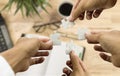 Group of business with hands together connecting piece of jigsaws puzzle at office Royalty Free Stock Photo