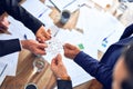 Group of business hands trying to connect puzzle pieces at office Royalty Free Stock Photo