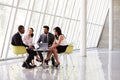 Group Business Meeting In Reception Of Modern Office Royalty Free Stock Photo