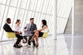 Group Business Meeting In Reception Of Modern Office Royalty Free Stock Photo