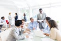 Group Of Business People Around The Conference Table