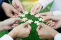 group of business people assembling jigsaw puzzle. The concept of cooperation, teamwork, help and support in business Royalty Free Stock Photo