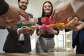 Group of business people assembling jigsaw puzzle at office. Cooperation, teamwork support concept Royalty Free Stock Photo