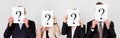 Group Business People Behind Question Mark Royalty Free Stock Photo