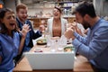 Group of business people chatting and using laptop in cafe at the coffee shop cafe  talking and laughing together Royalty Free Stock Photo