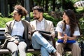 Group of business people discussing ideas at meeting outside. Businesswoman and businessman outdoor near office building talking Royalty Free Stock Photo