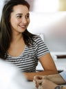 Group of business people discussing questions at meeting. Portrait of casual dressed businesswoman happy smiling to her Royalty Free Stock Photo