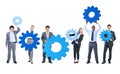 Group of Business People with Gears Royalty Free Stock Photo