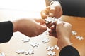 Group of Business people hands are connecting jigsaw puzzle. Royalty Free Stock Photo