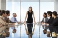 Group Of Business People Having Board Meeting Around Glass Table Royalty Free Stock Photo