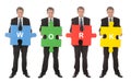 Group of business people holding jigsaw puzzle Royalty Free Stock Photo