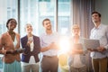 Group of business people holding mobile phone, digital tablet and laptop Royalty Free Stock Photo