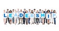 Group Of Business People Holding The Word Leadership