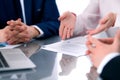 Group of business people and lawyers discussing contract papers Royalty Free Stock Photo