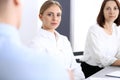 Group of business people or lawyers discussing terms of transaction in office. Colleagues working all together. Focus a Royalty Free Stock Photo