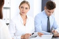 Group of business people or lawyers discussing terms of transaction in office. Colleagues working all together. Focus a Royalty Free Stock Photo