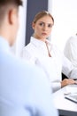 Group of business people or lawyers discussing terms of transaction in office. Colleagues working all together. Focus a Royalty Free Stock Photo