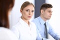 Group of business people or lawyers discussing terms of transaction in office. Colleagues working all together. Focus a Royalty Free Stock Photo