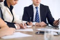 Group of business people or lawyers at meeting, hands close-up