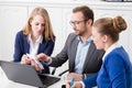 Group of business people meeting around conference table and loo Royalty Free Stock Photo