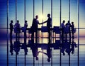 Group of Business People Meeting in Back Lit Royalty Free Stock Photo