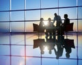 Group of Business People Meeting in Back Lit Concept Royalty Free Stock Photo