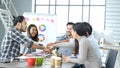 Group of business people meeting in conference room. Asian businessman speech, present teamwork partnership. Happy business people Royalty Free Stock Photo