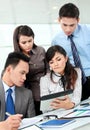 Group of business people meeting with laptop