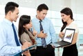 Group of business people meeting with laptop