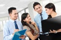 Group of business people meeting with laptop