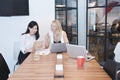 Group of business people meeting in a meeting room, sharing their ideas Royalty Free Stock Photo