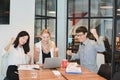 Group of business people meeting in a meeting room, sharing their ideas Royalty Free Stock Photo