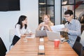 Group of business people meeting in a meeting room, sharing their ideas Royalty Free Stock Photo