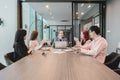 Group of business people meeting in a meeting room, sharing their ideas, Multi ethnic Royalty Free Stock Photo