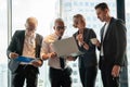 Group of business People Meeting  in office on window . marketing team Conference Brainstorming. manager man standing and present Royalty Free Stock Photo